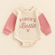Load image into Gallery viewer, Auntie's Bestie pink waffle baby romper on a light beige background