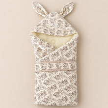 Load image into Gallery viewer, Floral baby swaddle blanket with bunny ears, laid flat