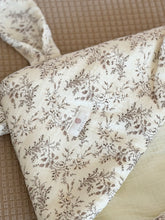 Load image into Gallery viewer, Close-up of the floral bunny ear swaddle wrap