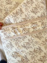 Load image into Gallery viewer, Close-up of the floral cotton fabric and swaddle detail
