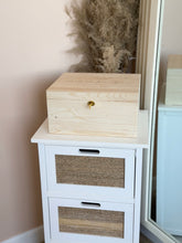 Load image into Gallery viewer, Closed wooden baby keepsake box with engraved lid and gold key
